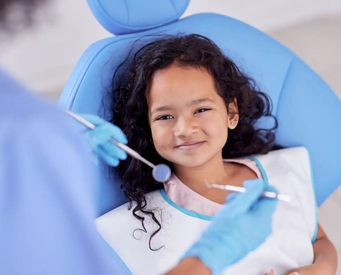 Dental Sealants for adults and kids Little Girl Getting a Dental Cleaning