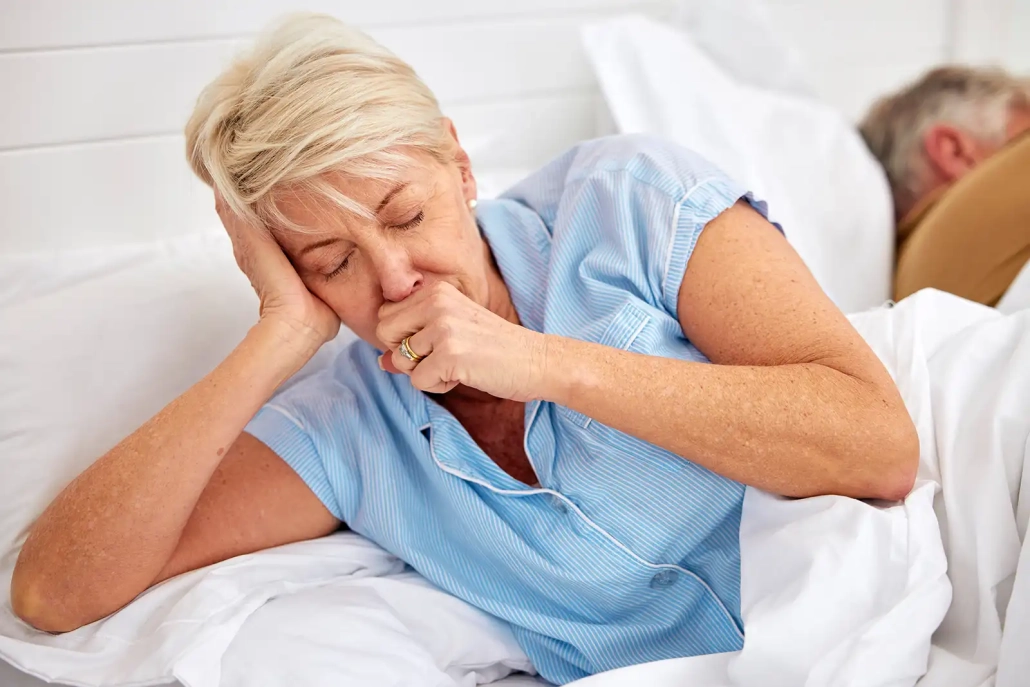 Compromised immune systems - woman coughing