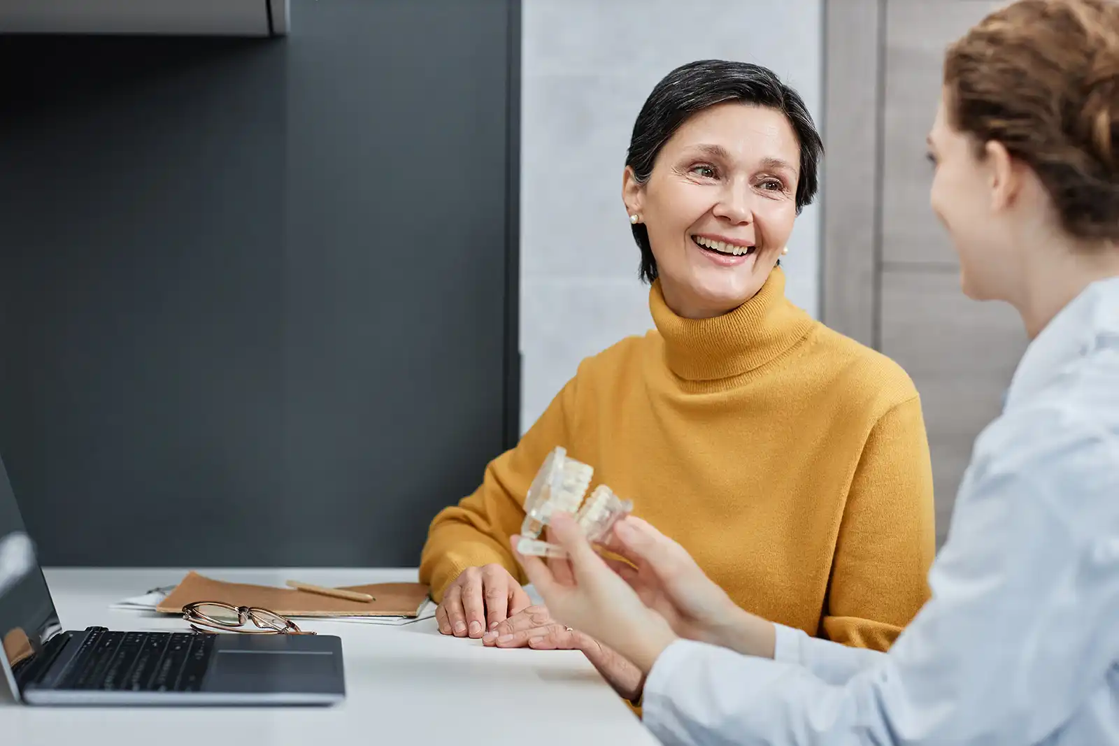 Dental Implants for older woman talking