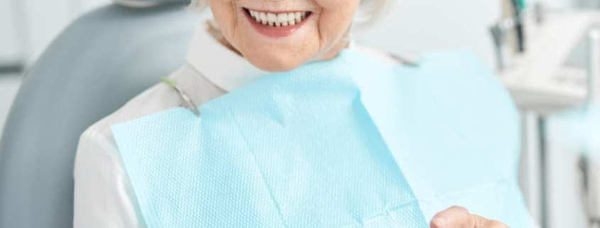Senior lady doing dental care Hudson MA.
