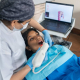 Patient having dental laser treatment.